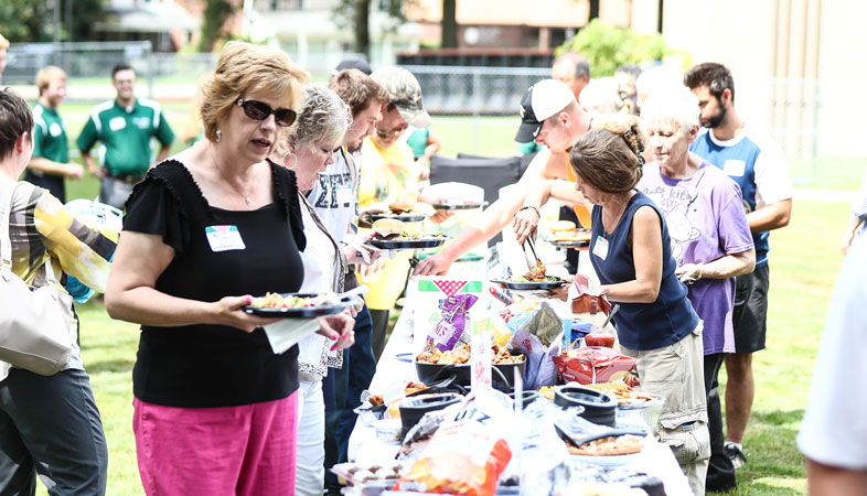 staff members fill their plates