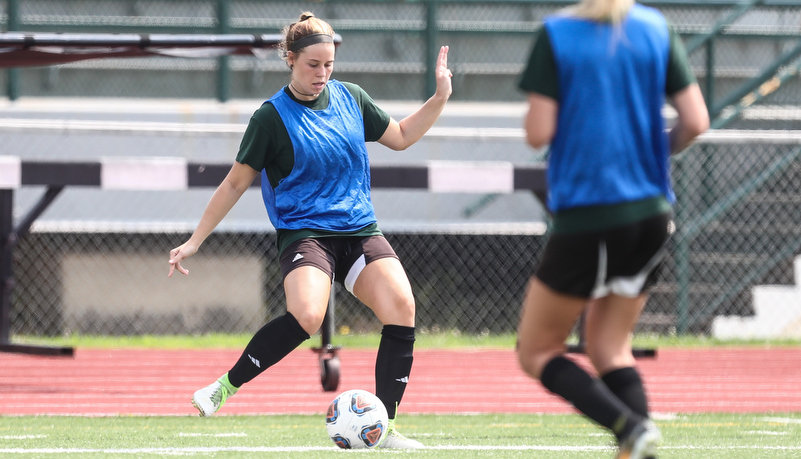 Women playing soccer