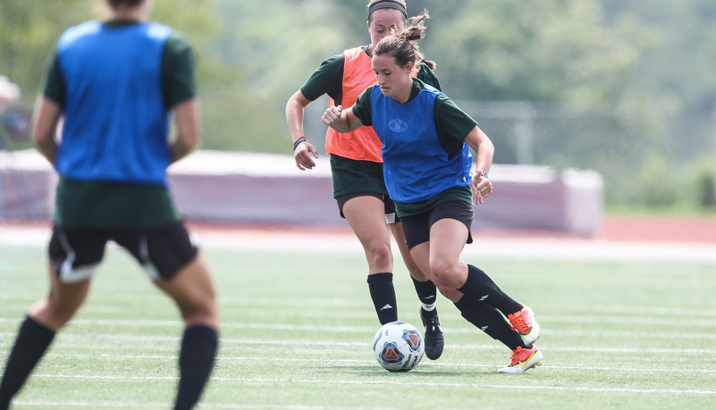 Women playing soccer