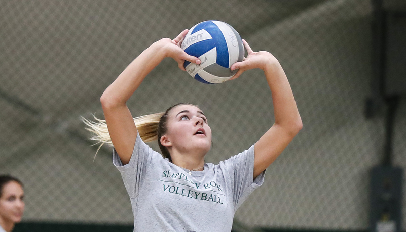 Women playing volleyball