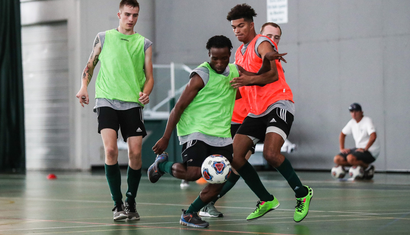 Men playing soccer