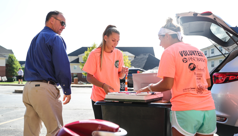 Students helping with move in