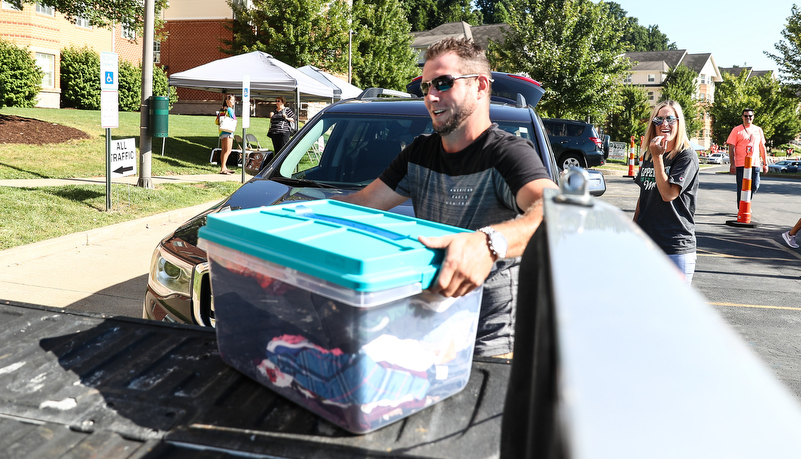 Students helping with move in