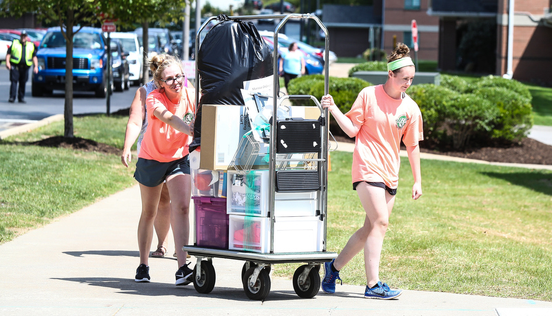 Students helping unload