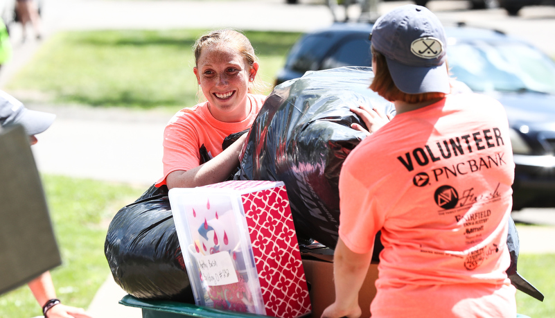 Students helping unload