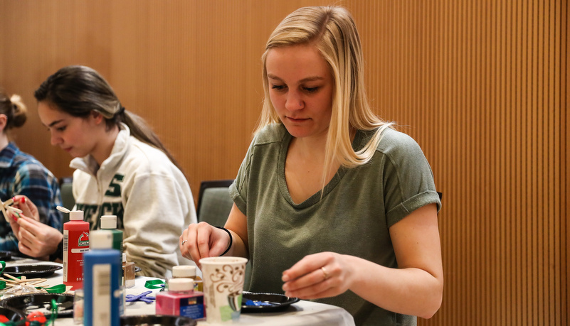 Student making an ornament