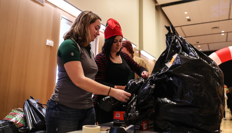 Students sorting gifts