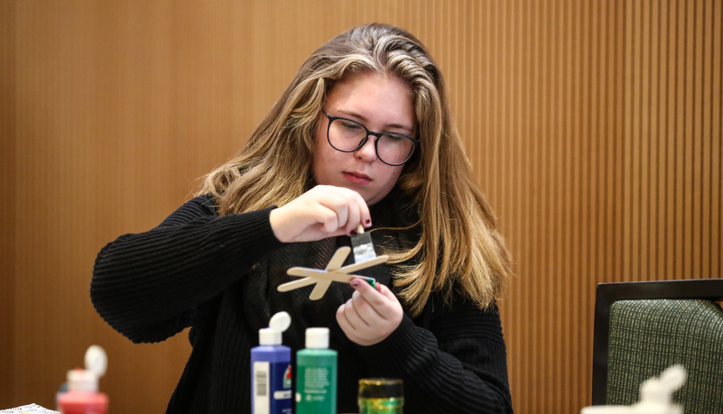 Students making ornaments