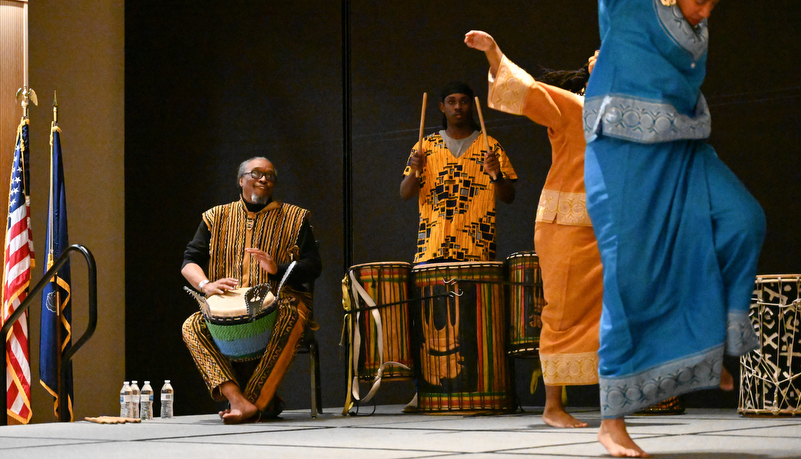 Men playing the drums