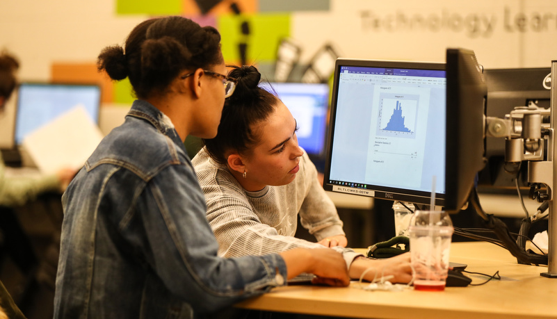 students working on a computer