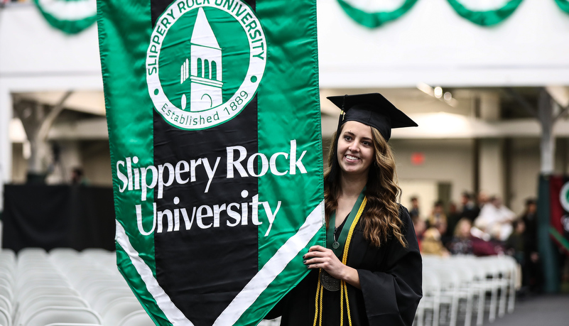 woman with the university banner