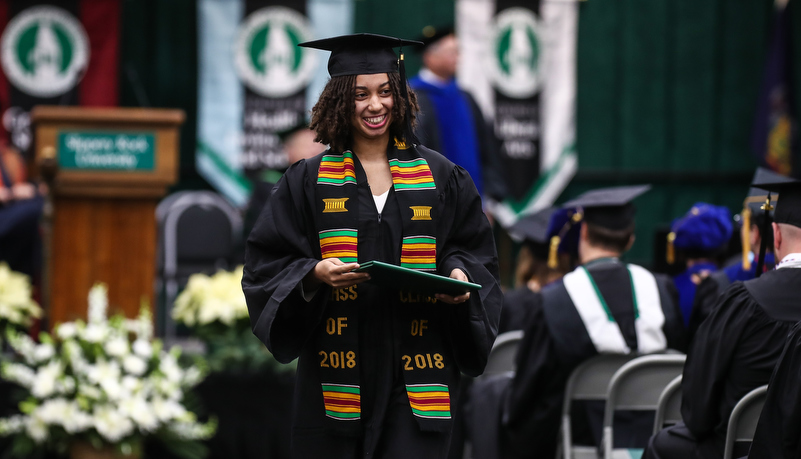 Graduate with her diploma