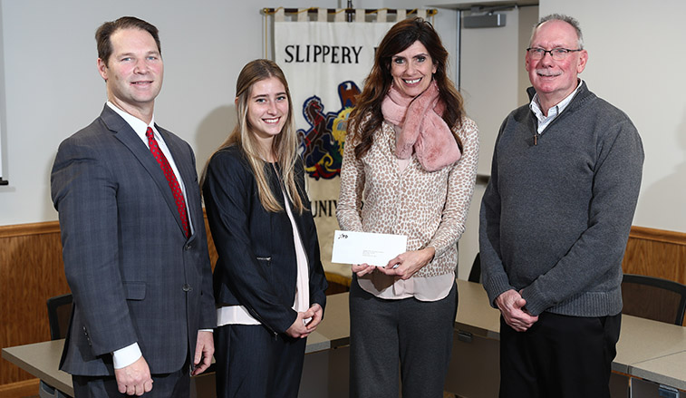 group photo of check presentation