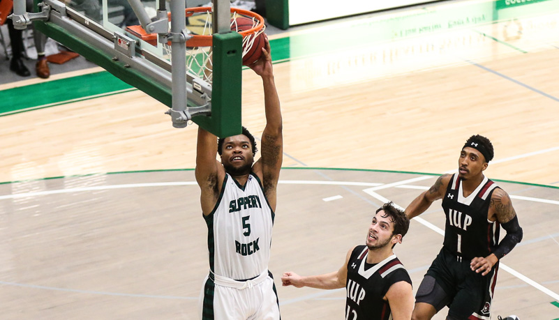  Bruce Spruell goes up for a dunk