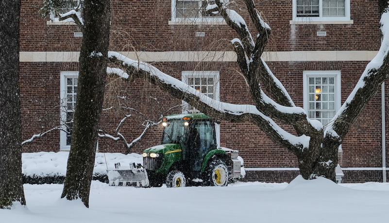 Tractor plowing the sidewalks