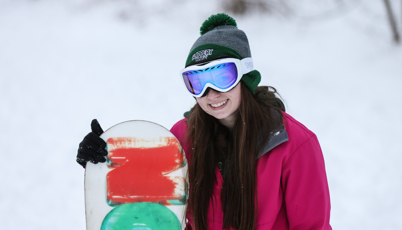 Students sled riding