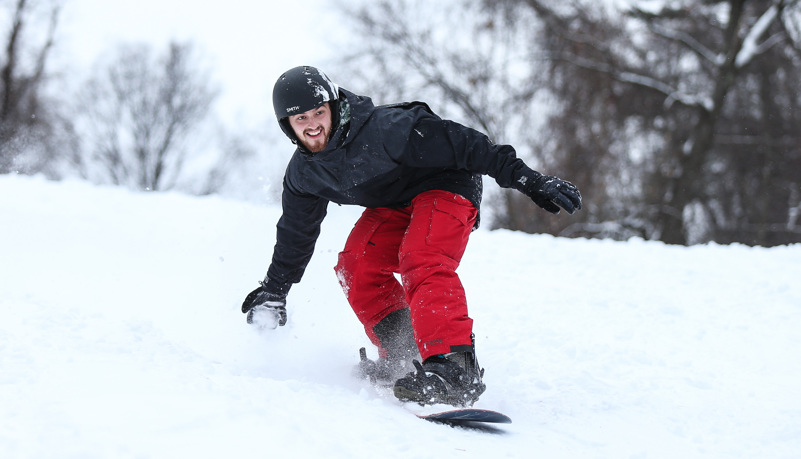 Students sled riding