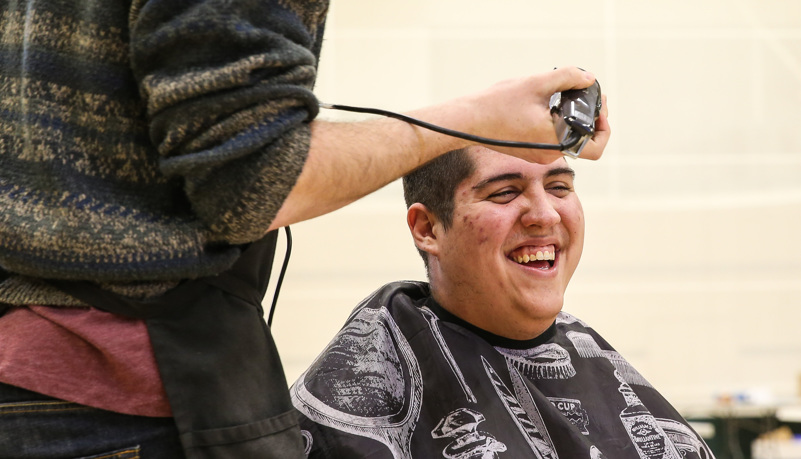 Man getting his head shaved