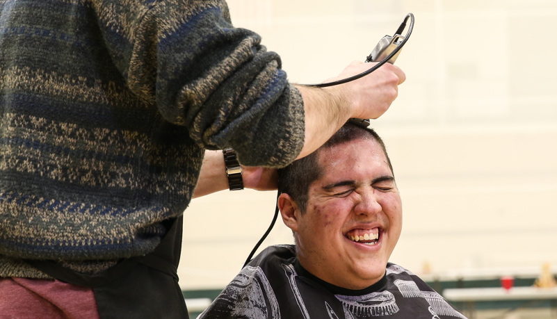 Man getting his head shaved