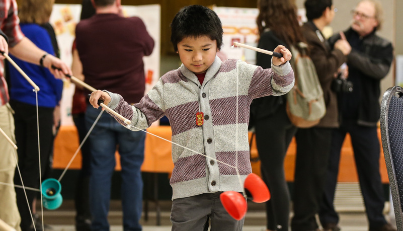 Boy playing Chinese game