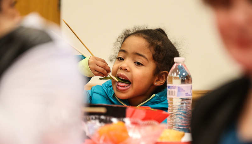 Girl eating Chinese food