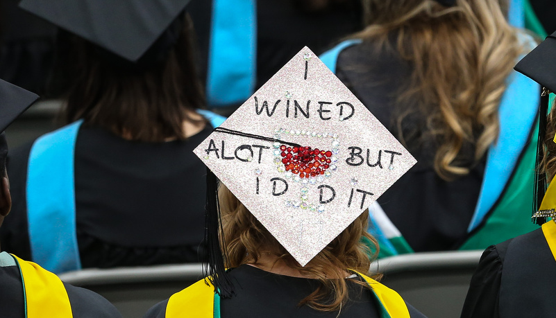 Decorated graduation cap that reads I wined a lot but I did it