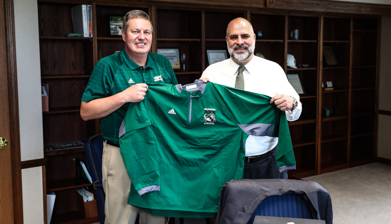 President Behre with Paul Luken an SRU jacket