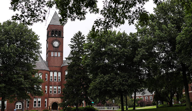 Old Main through the trees