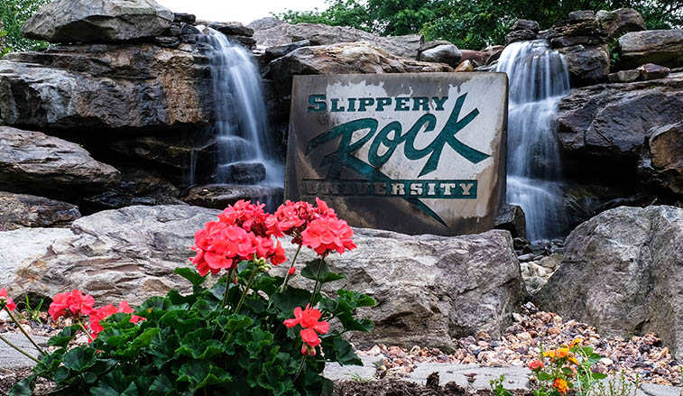 Water fountain with University sign