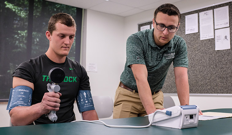 Two students conducting a study