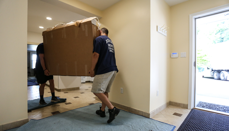 crew unloading the moving truck