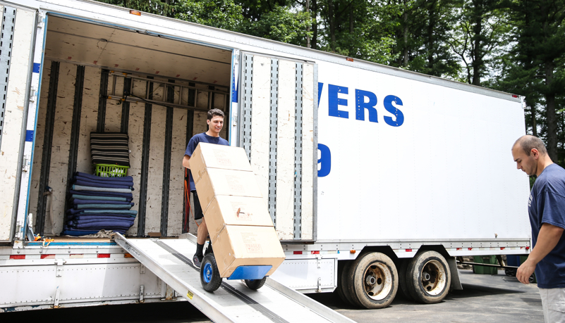 crew unloading the moving truck