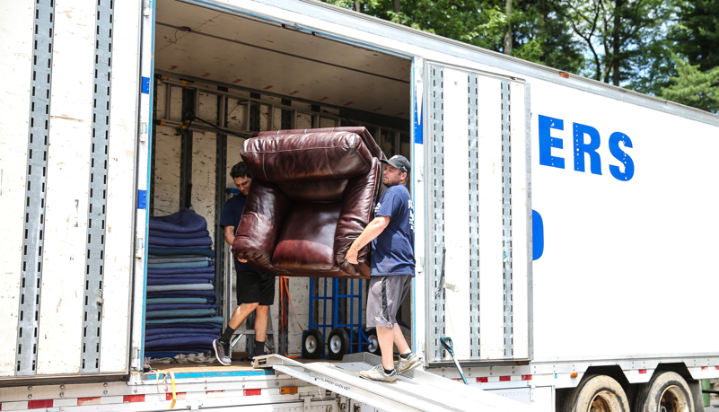 crew unloading the moving truck