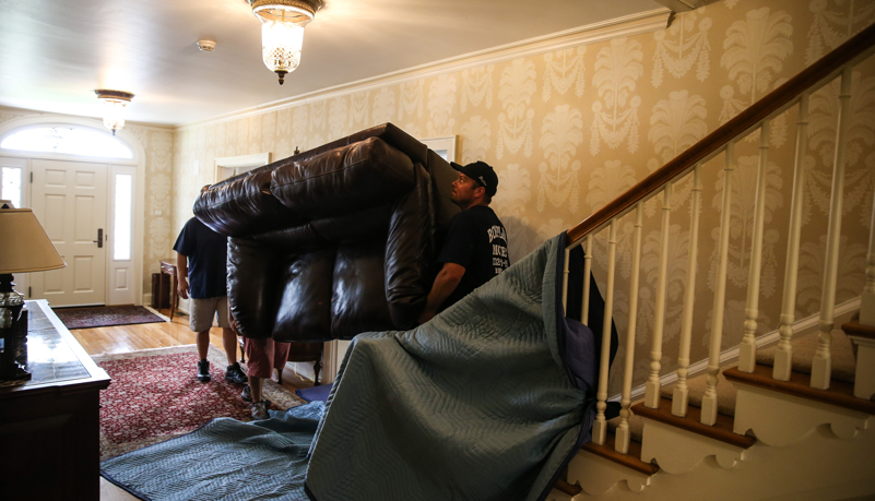 crew unloading the moving truck