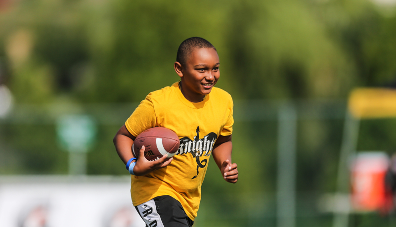 Kids playing football