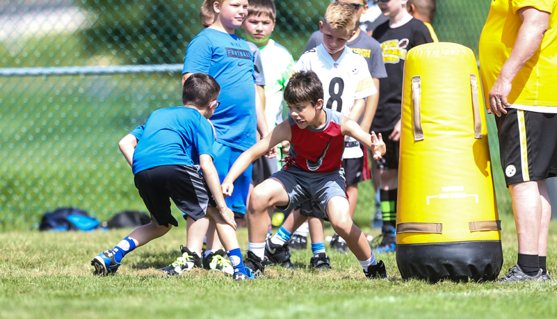 Kids playing football