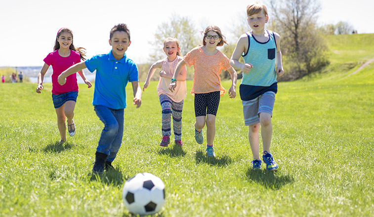 Children playing soccer