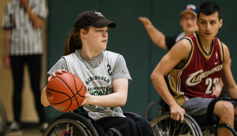 Woman passing a basketball