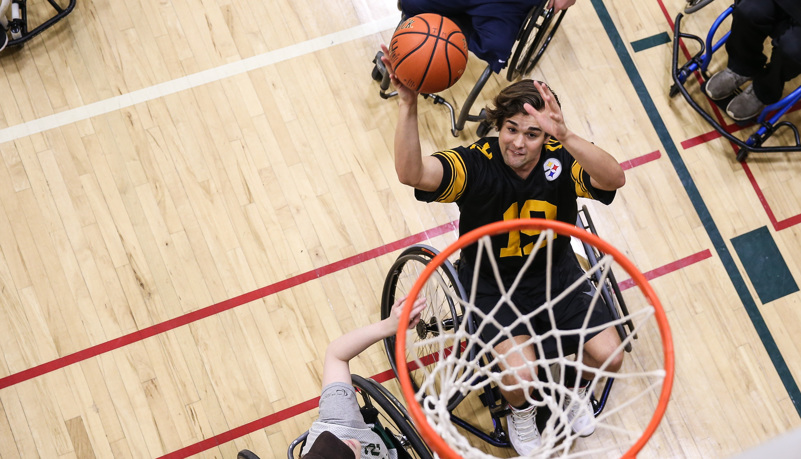 Man shooting a basketball