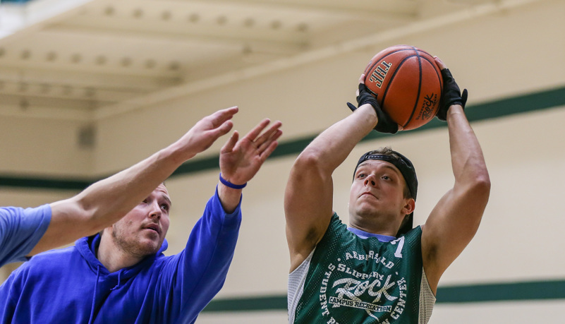 Man shooting a basketball