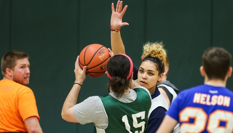 Woman defending a player