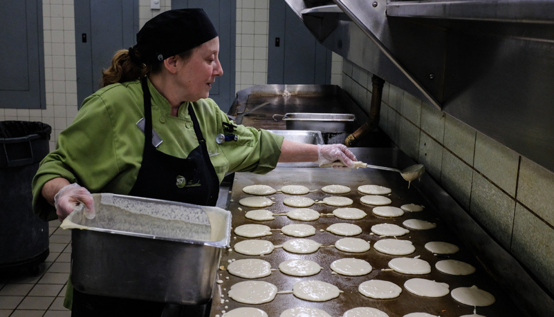 Cook making Pancakes