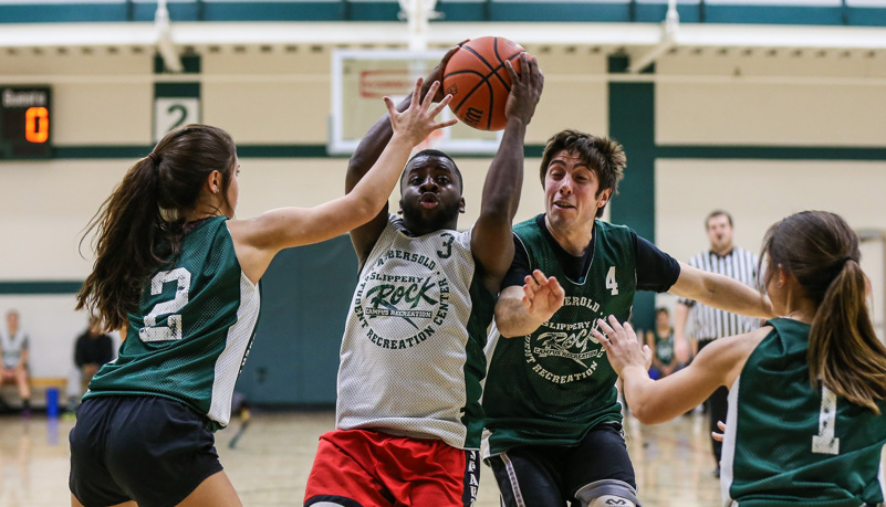 Students playing basketball