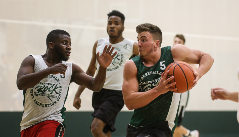 Students playing basketball