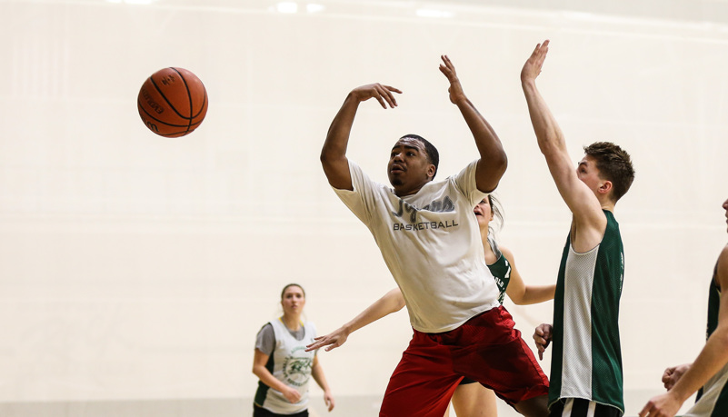 Students playing basketball