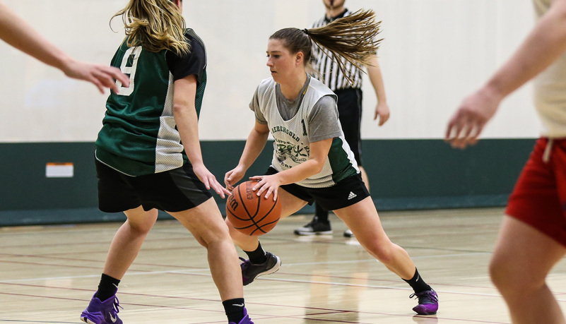 Students playing basketball
