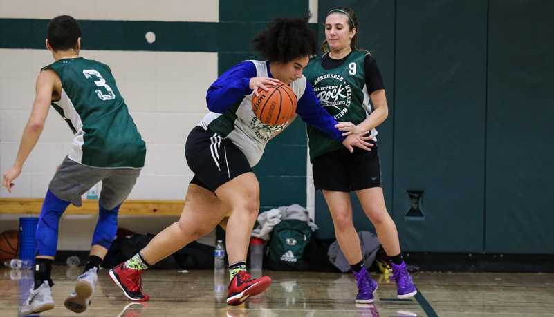 Students playing basketball