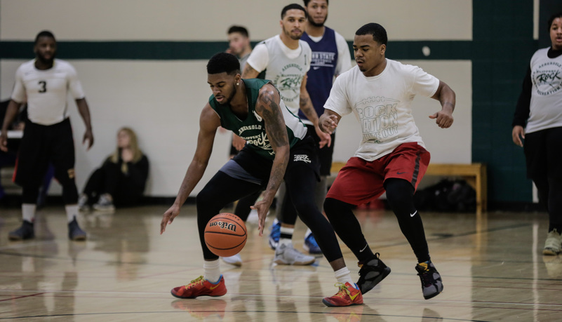 men playing basketball