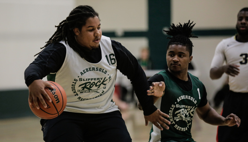 men playing basketball