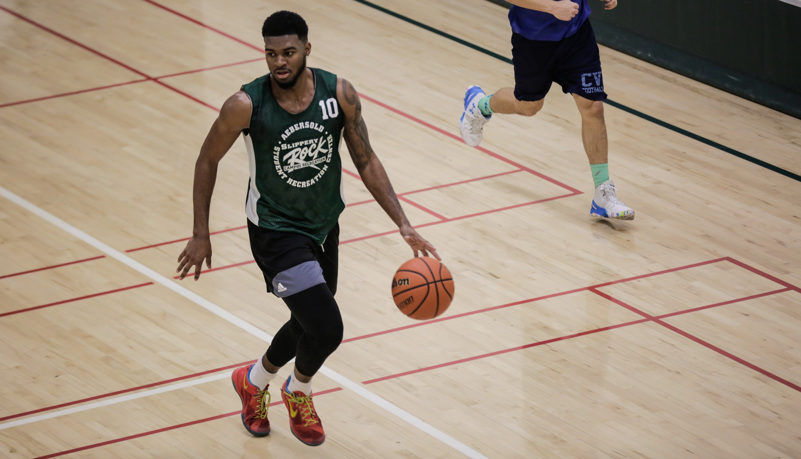 men playing basketball